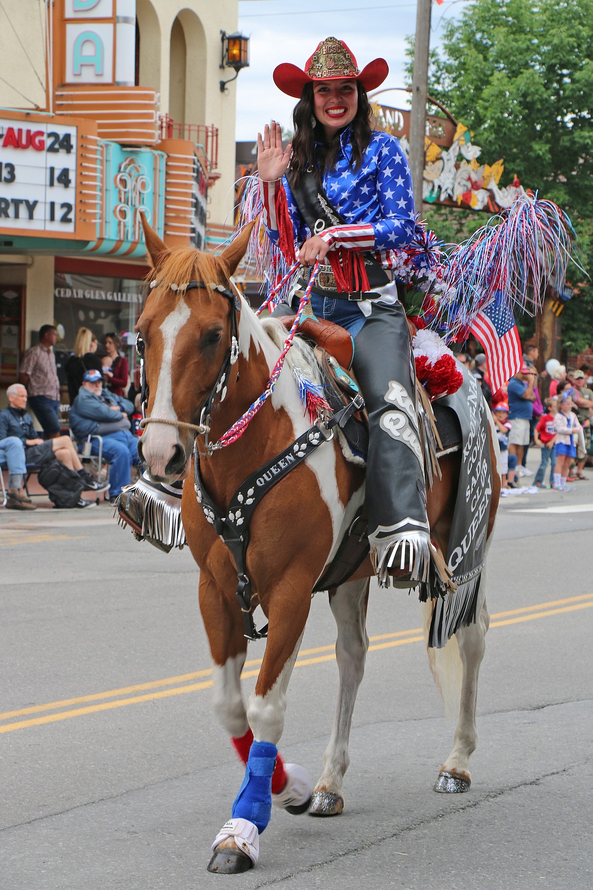 (Photo by CAROLINE LOBSINGER)A rider makes her way down First Avenue during the Sandpoint Lions' Fourth of July Grand Parade on Thursday.