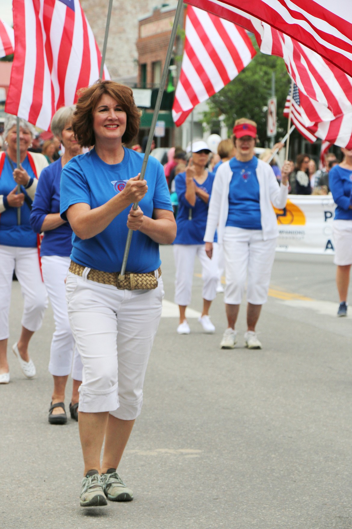 (Photo by CAROLINE LOBSINGER)Community Assistance League members make their way down First Avenue Thursday during the Sandpoint Lions' Fourth of July Grand Parade.