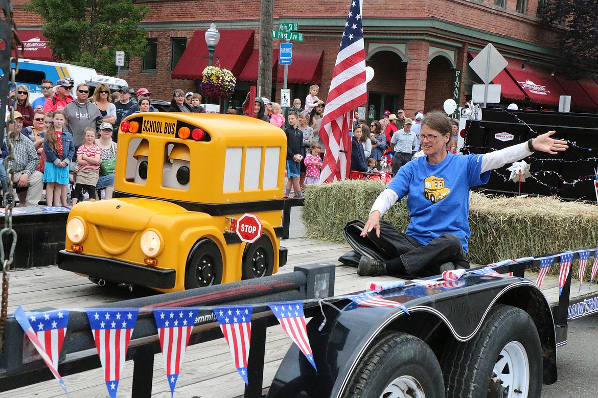 (Photo by CAROLINE LOBSINGER)Parade participants make their way down First Avenue during the Sandpoint Lions' Fourth of July Grand Parade on Thursday.