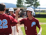 Lums sweep, clinch top seed to districts