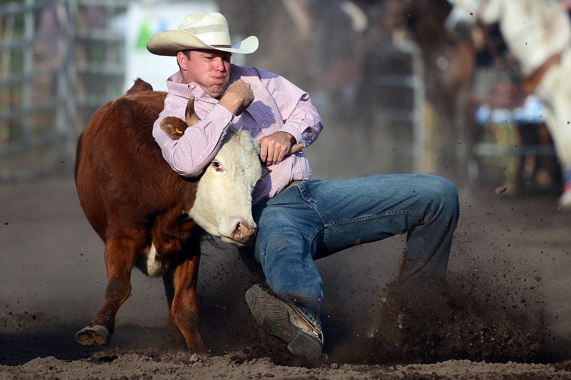 Cody Wiberg, of Victor, competes in the Steer Wrestling event at the Bigfork Rodeo on Friday. (Casey Kreider/Daily Inter Lake)