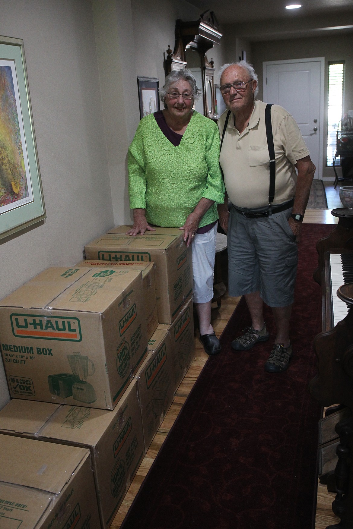 CRAIG NORTHRUP/Press
Janet and Fred Bourque stack boxes of care packages along the halls of their Coeur d&#146;Alene home. The 100-plus packages the Bourques have already sent contained clothes, shoes, sewing material and anything else the villagers of Chajul, Guatemala, need.