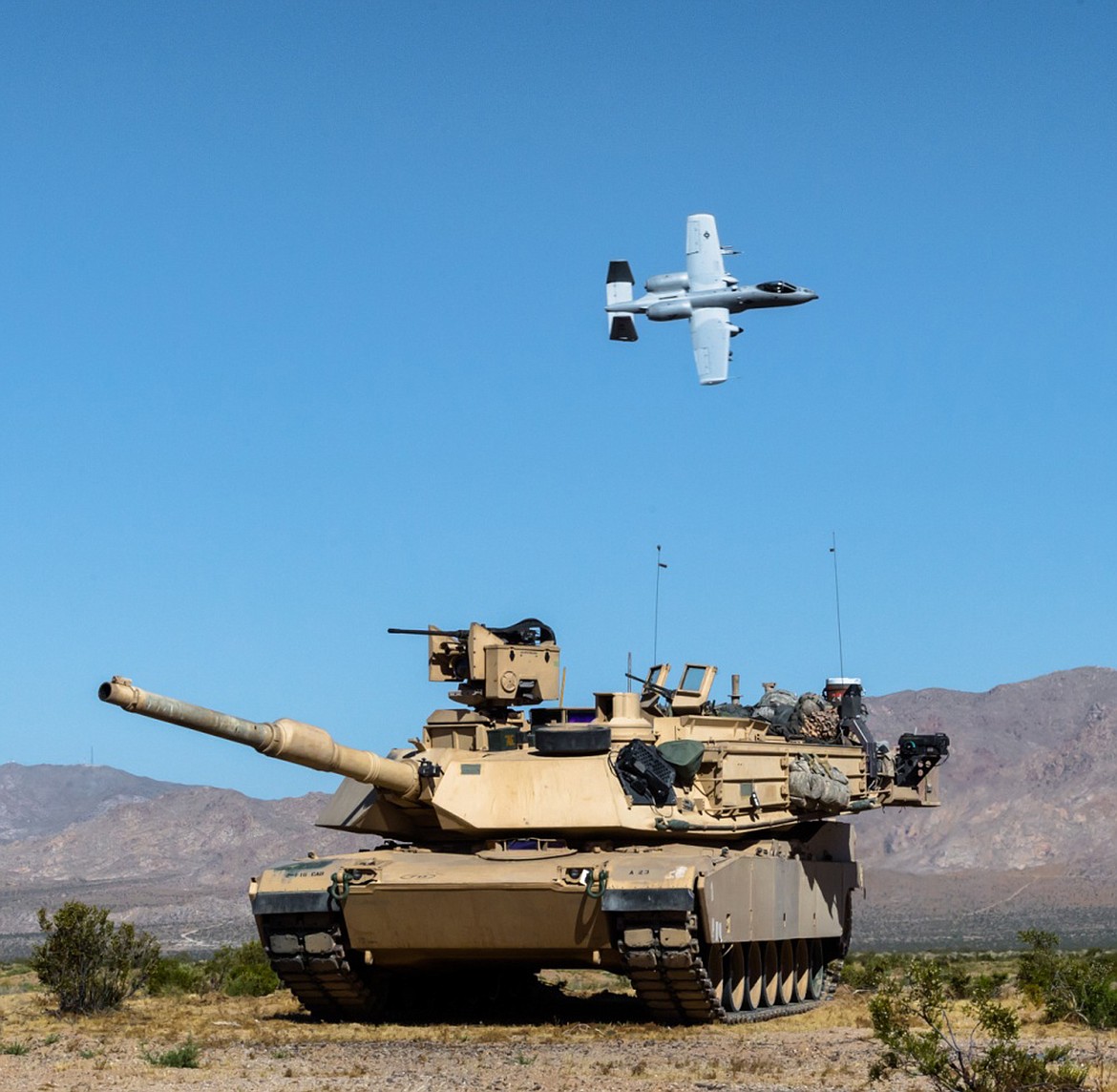 (U.S. Army National Guard photo by Sgt. Mason Cutrer)An Idaho Air National Guard A-10 C Thunderbolt II from the 124th Fighter Wing flies over the Idaho Army National Guard&#146;s 2nd Battalion, 116th Cavalry Regiment&#146;s defensive line June 13, 2019 at the National Training Center at Fort Irwin, California. Throughout NTC the 116th Cavalry Brigade Combat Team and the 124th Fighter Wing, both headquartered in Boise, have trained alongside each other to build unit readiness and increase proficiency in each unit&#146;s wartime missions.