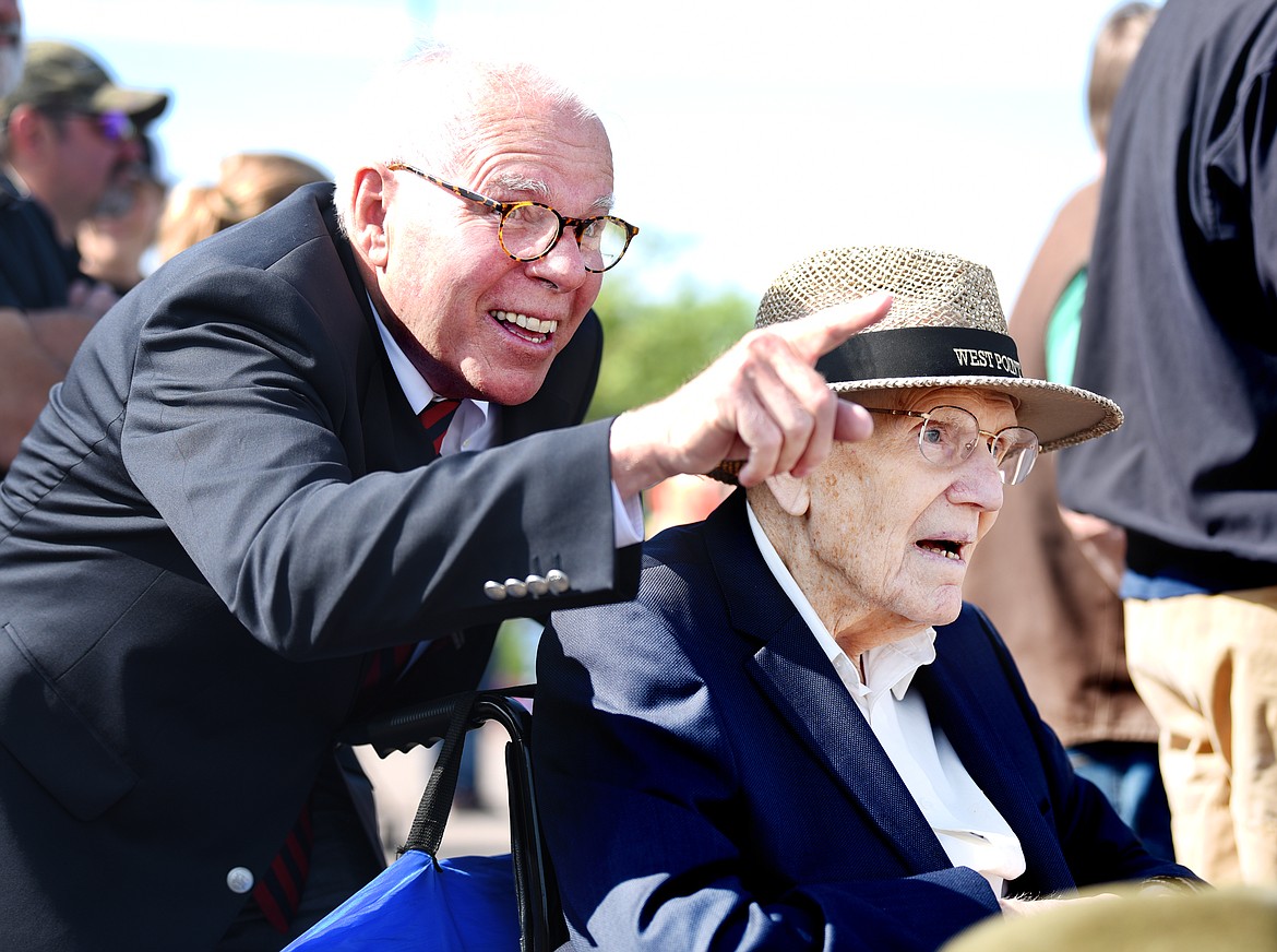 Ret. Maj. Gen. Neil Van Sickle, the oldest living West Point graduate, enjoys the Wings of Freedom bombers with his friend Jeff Wirth of Whitefish, on Friday in Kalispell. (Brenda Ahearn/Daily Inter Lake)
