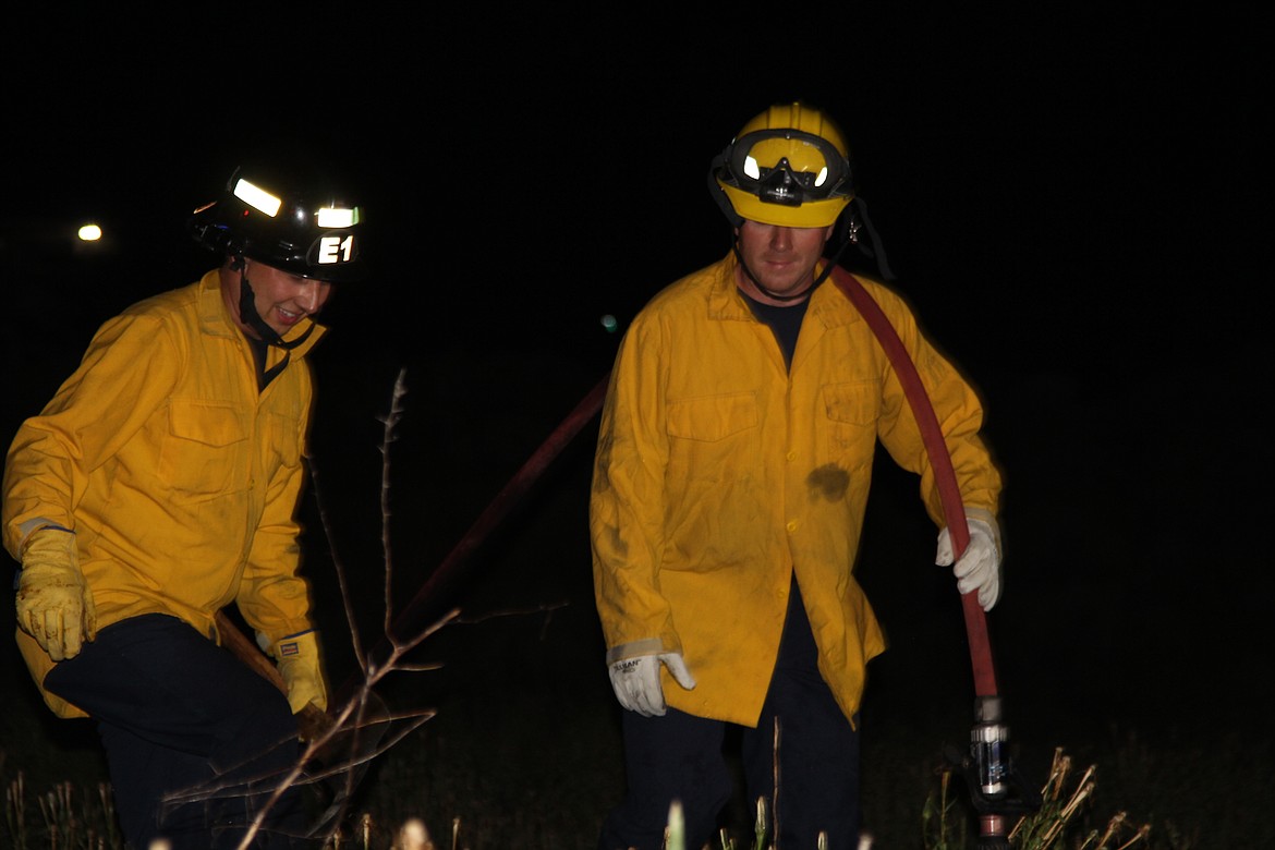 Emry Dinman/Columbia Basin Herald
 The members of the Moses Lake Fire Department&#146;s C Platoon faced a hectic night this Fourth of July, with medical calls, a string of fires and a faulty alarm that kept ringing in the Walmart deli.