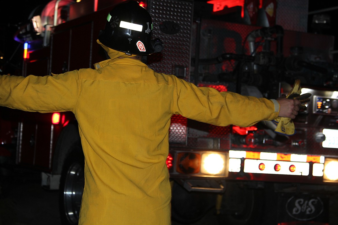 Emry Dinman/Columbia Basin Herald
 The members of the Moses Lake Fire Department&#146;s C Platoon faced a hectic night this Fourth of July, with medical calls, a string of fires and a faulty alarm that kept ringing in the Walmart deli.