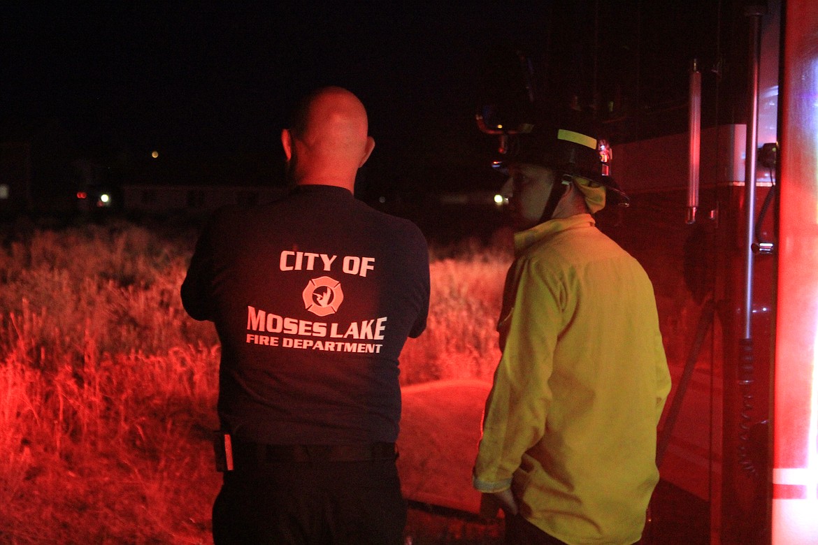 Emry Dinman/Columbia Basin Herald
 The members of the Moses Lake Fire Department&#146;s C Platoon faced a hectic night this Fourth of July, with medical calls, a string of fires and a faulty alarm that kept ringing in the Walmart deli.