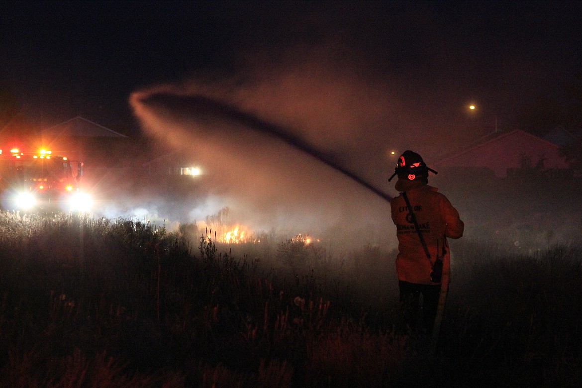 Emry Dinman/Columbia Basin Herald
 The members of the Moses Lake Fire Department&#146;s C Platoon faced a hectic night this Fourth of July, with medical calls, a string of fires and a faulty alarm that kept ringing in the Walmart deli.