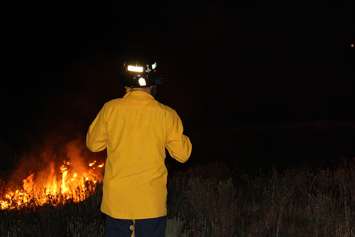 Emry Dinman/Columbia Basin Herald
 The members of the Moses Lake Fire Department&#146;s C Platoon faced a hectic night this Fourth of July, with medical calls, a string of fires and a faulty alarm that kept ringing in the Walmart deli.