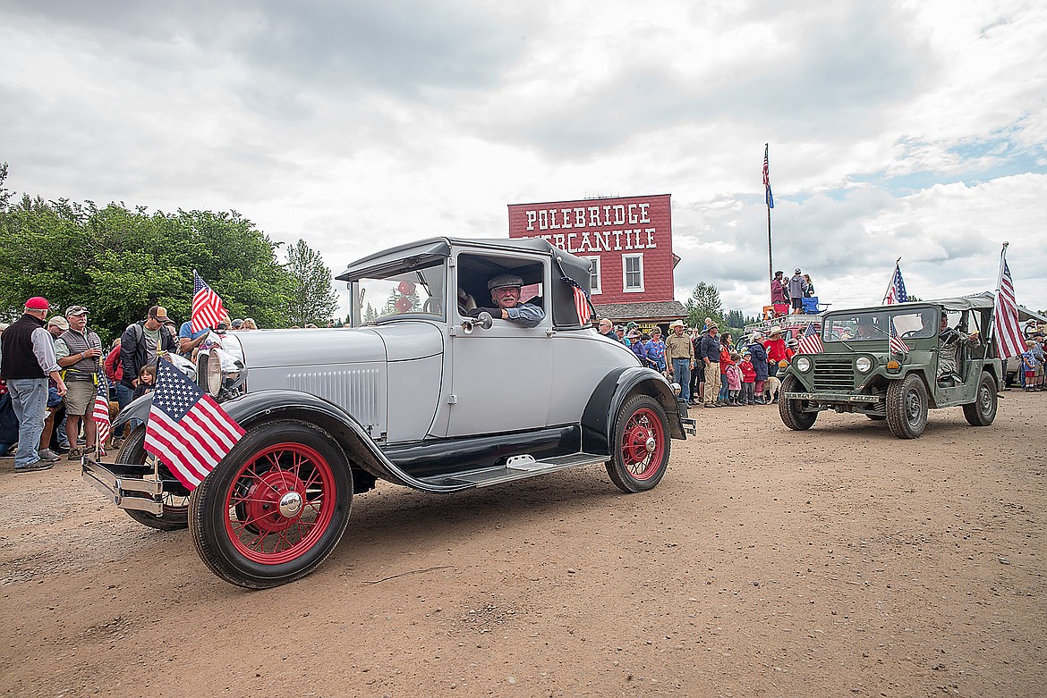 A vintage rig starts off the parade.