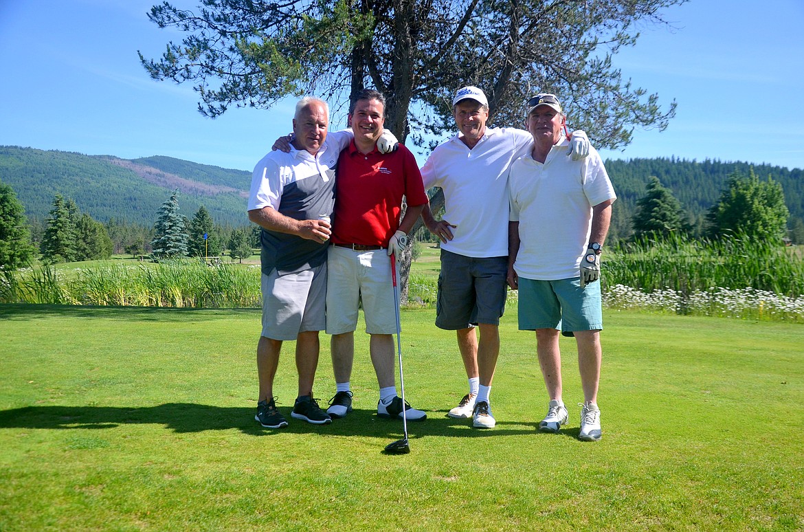 (Photo courtesy of LOIS ROBERTSON PHOTOGRAPHY)
The Albeni Falls Building Supply team, consisting of Kevin Monahan, Matt Dieter, Mike Sandau and Jason Landon, poses after netting the lowest gross team score at the Fore the Health of It Golf Tournament on June 14.