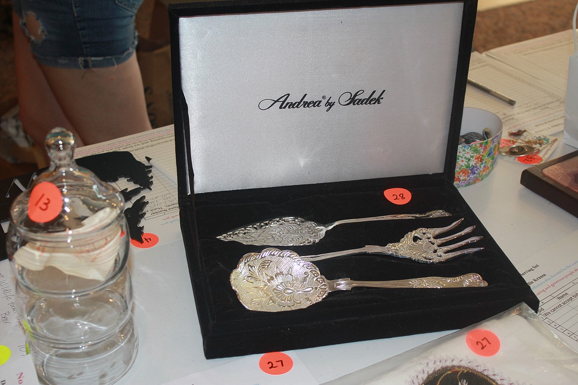 This set of silverware was among the silent auction items.