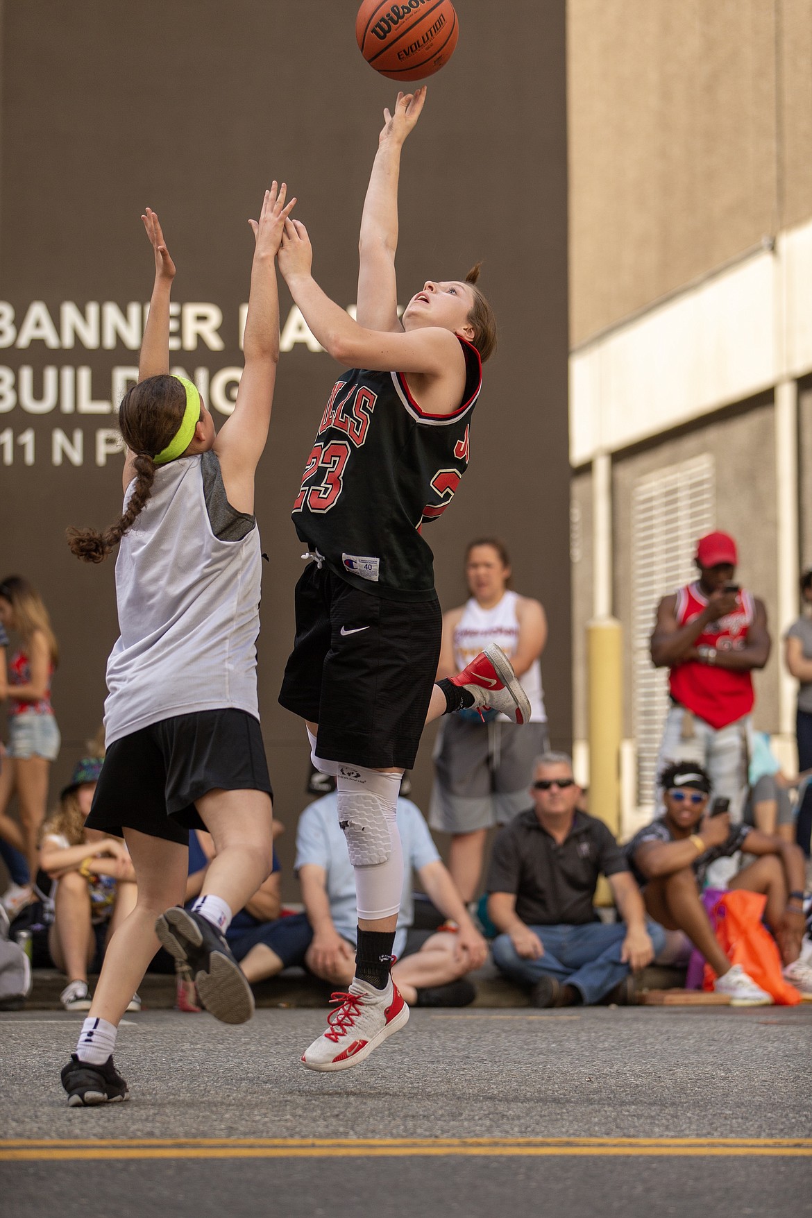 (Photo courtesy of JASON DUCHOW PHOTOGRAPHY)
Sandpoint senior Dawson Driggs shoots over a defender during 2019 Hoopfest last weekend.