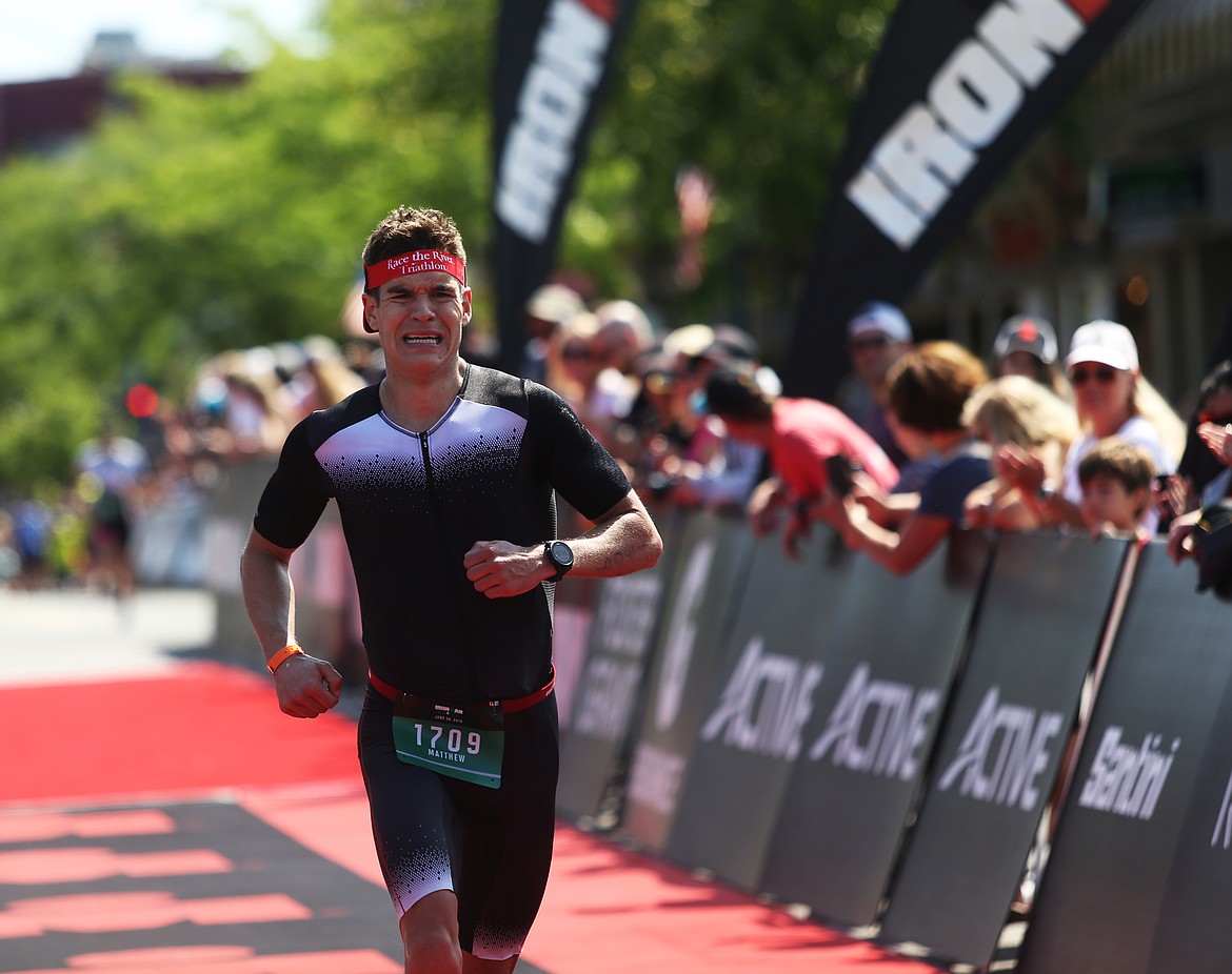 Matt Handwerk, of Coeur d&#146;Alene, approaches Ironman 70.3 Coeur d&#146;Alene finish line. Handwerk finished 6th in the 35-39 men&#146;s age group with a time of 4 hours, 35 minutes and 1 second. (LOREN BENOIT/Press)