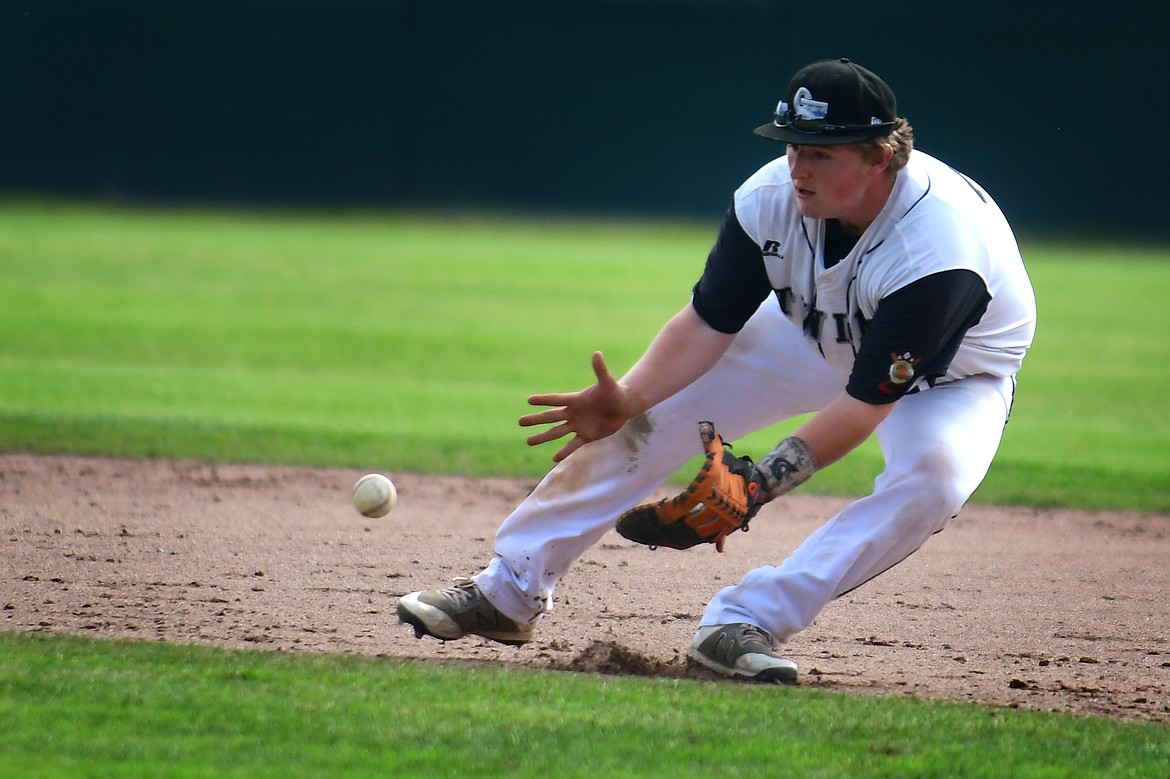 Glacier Twins player Austyn Andrachick makes a play on a ground ball during last week&#146;s game against the Missoula Mavericks. (Jeremy Weber/Hungry Horse News)