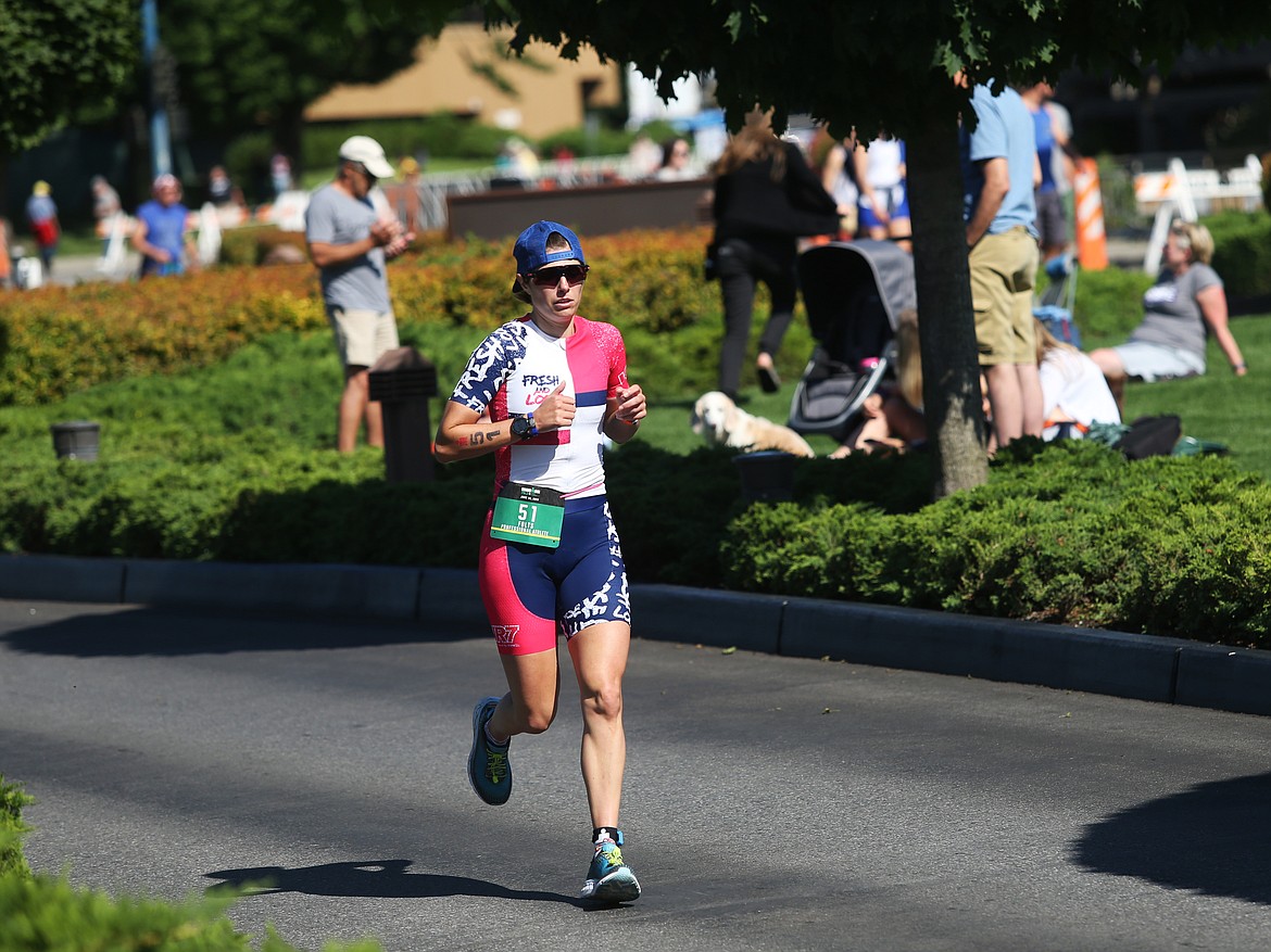 Monica Folts of Vashon Island, Wash., competes in the run portion of Ironman 70.3 Coeur d&#146;Alene.