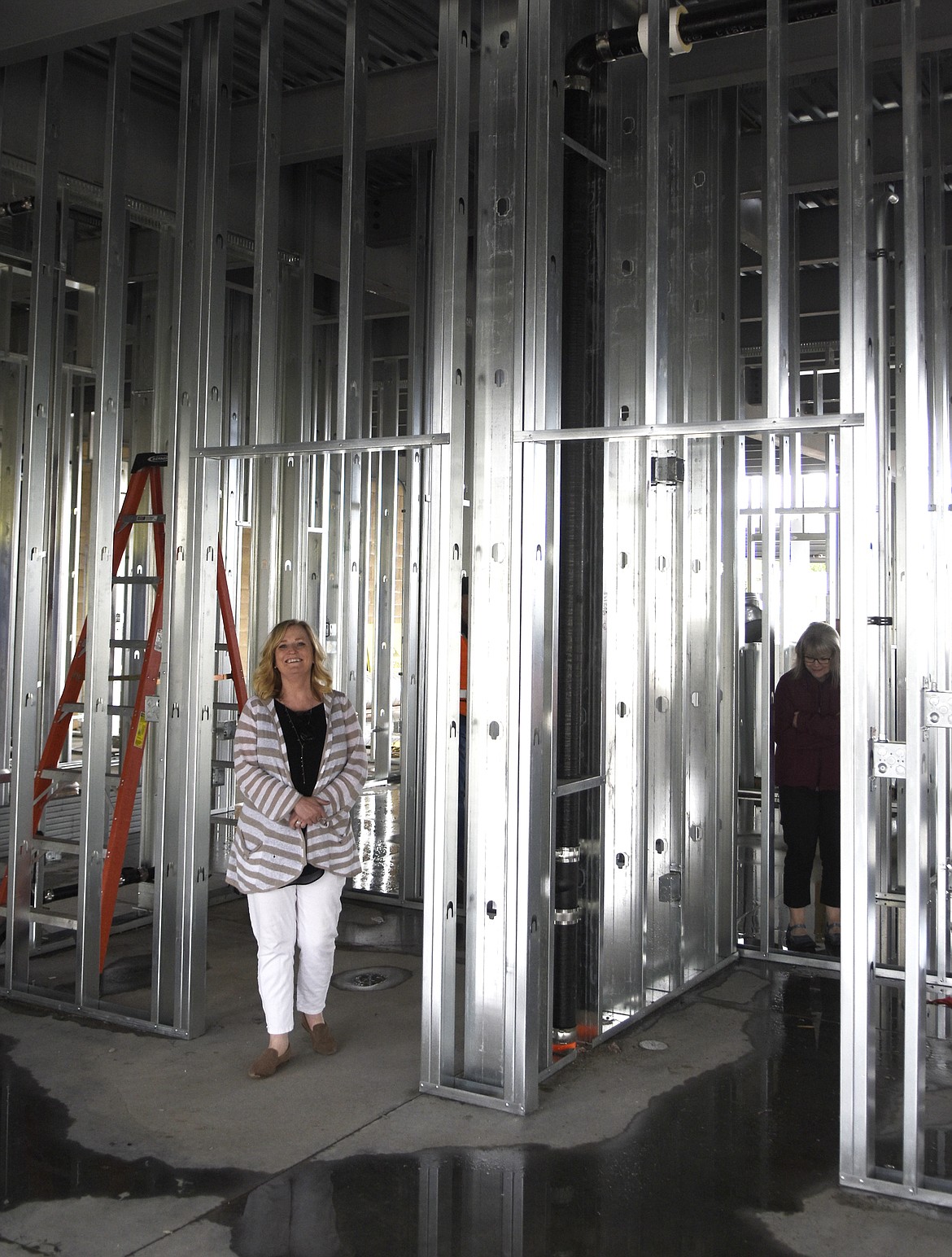 Whitefish School District Superintendent Heather Davis Schmidt walks through the new Muldown Elementary during a school board tour of the school. (Daniel McKay/Whitefish Pilot)