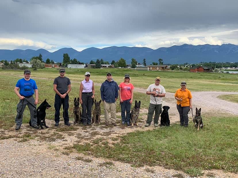 A FEW law enforcement officers from the western U.S. and Canada who participated in last week&#146;s canine law enforcement certification course in Polson. (from left): Shawn, with K9 Dahber, John Toews with Mya, Marijke Barnson with Java, Siw Lea with Ukey, Todd Schleusner with Jake, and Julie Balch with Talyn. (photo by Carolyn Hidy/Lake County Leader)