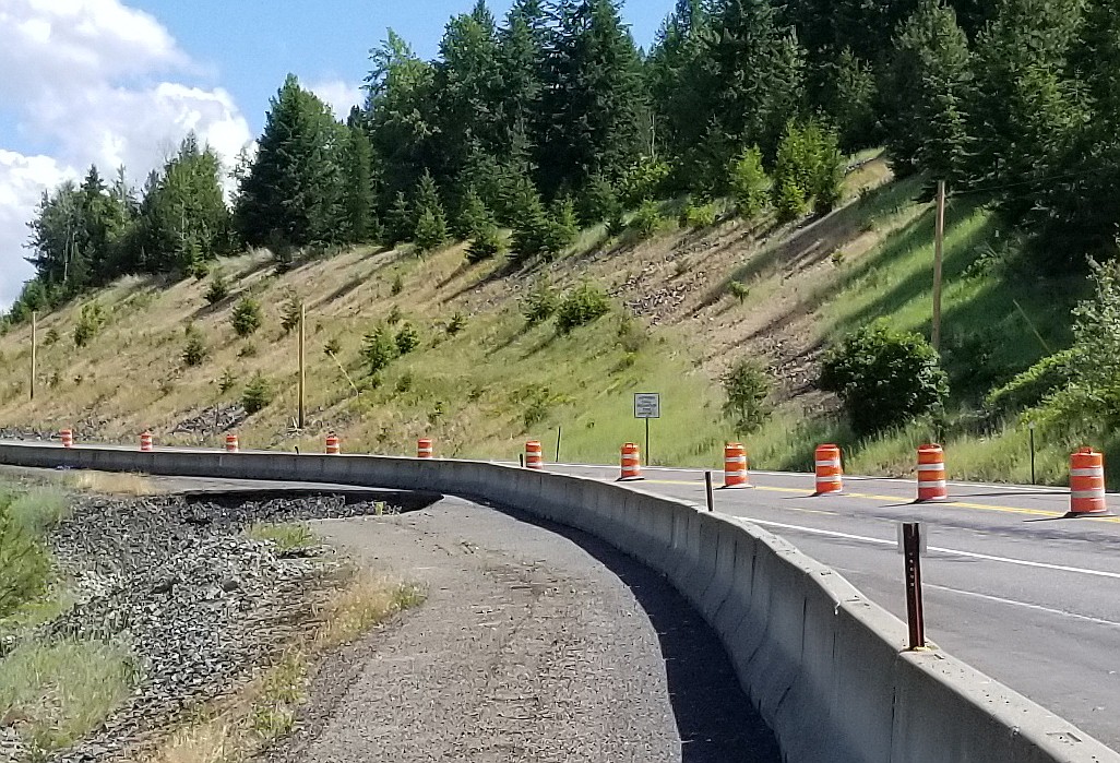 Photo by MANDI BATEMANthe slide has undermined the Highway 95, narrowing the lanes and creating a dogleg that is causing problems for drivers.