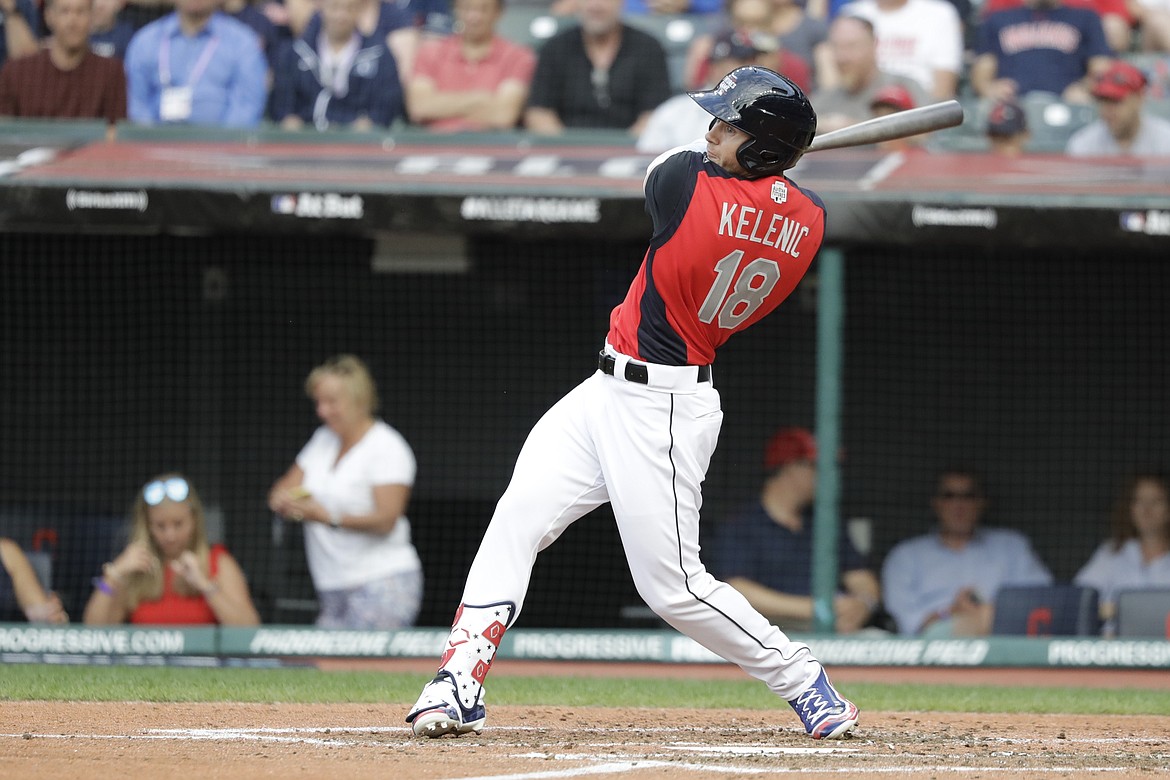 DARRON CUMMINGS/Associated Press
Seattle Mariners prospect Jarred Kelenic hits during the MLB All-Star Futures game July in Cleveland.