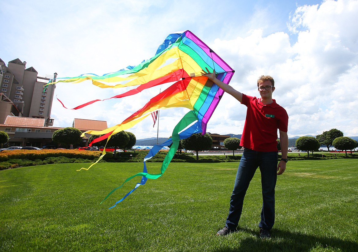 Figpickles employee Kevin Eaton displays a kite on the lawn of The Coeur d&#146;Alene Resort. (LOREN BENOIT/Press)