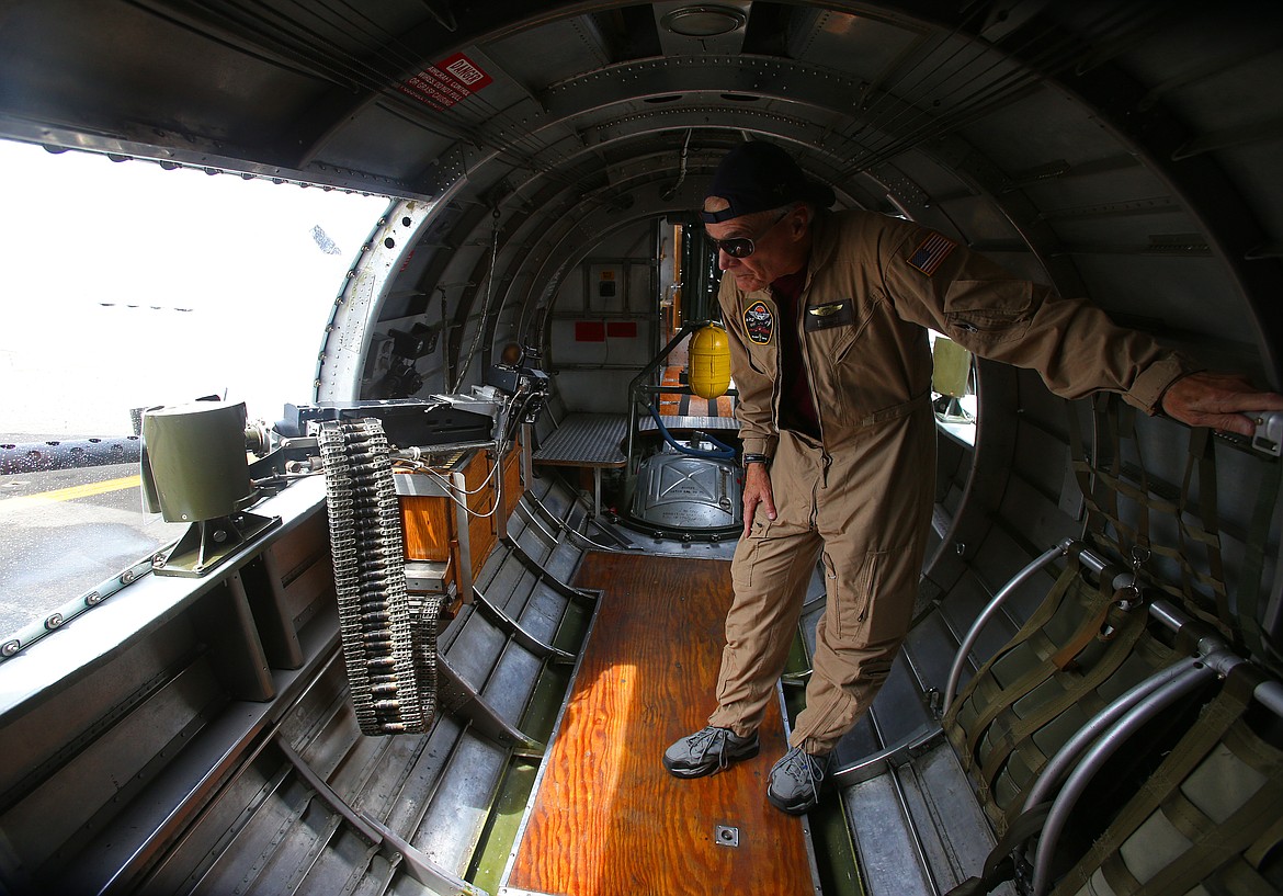 &#147;Sentimental Journey&#148; crew member Bill Croutch looks out of one of the gunner windows inside a B17 Flying Fortress at the Coeur d&#146;Alene Airport. The plane has thirteen .50 caliber machine guns, from nose to tail. The plane will be on display this weekend at the Coeur d&#146;Alene Air Expo.(LOREN BENOIT/Press)