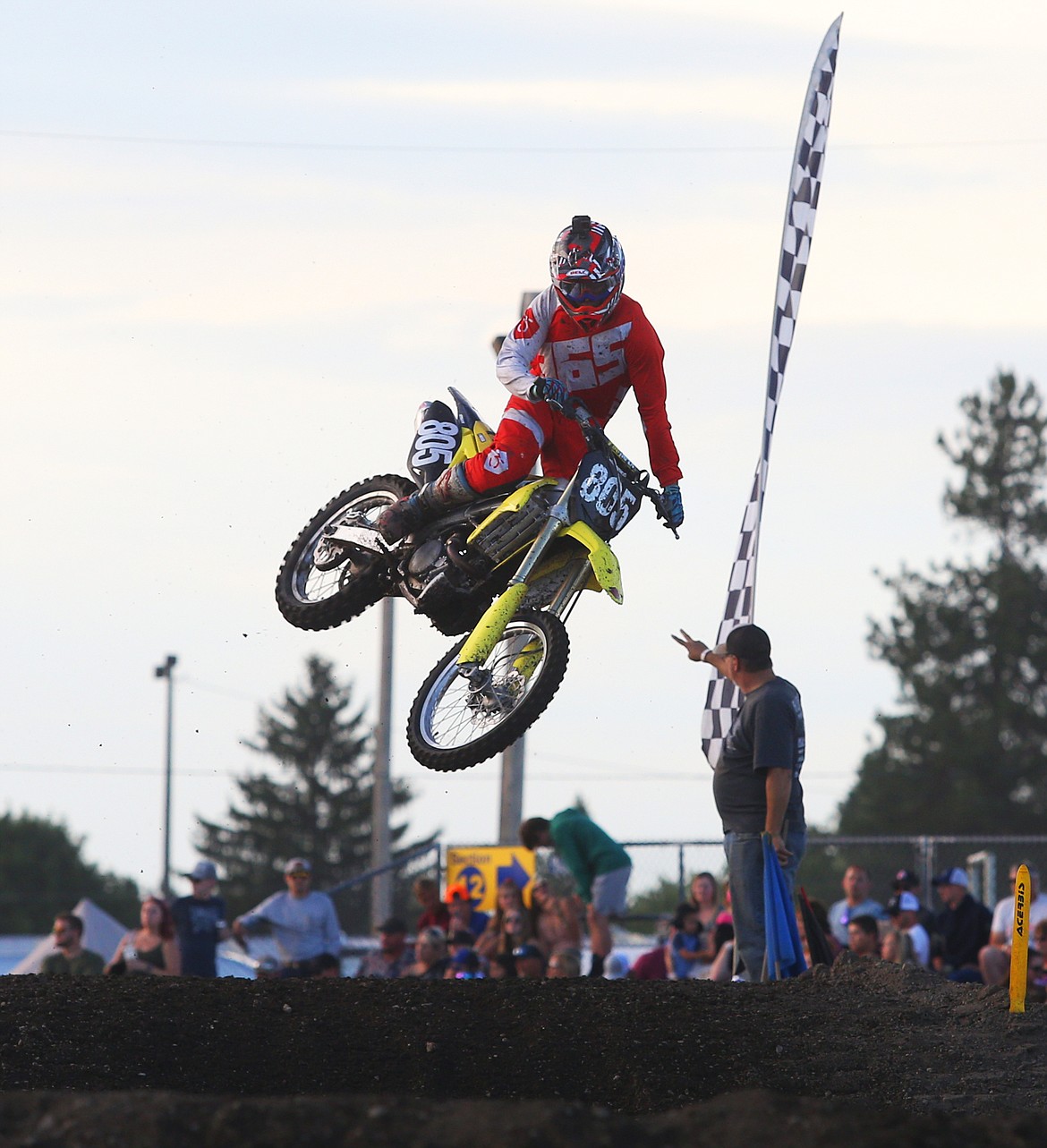 Kolton Pollinsky soars through the air with two laps to go in the 250 Pro arenacross race Friday night at the Kootenai County Fairgrounds.