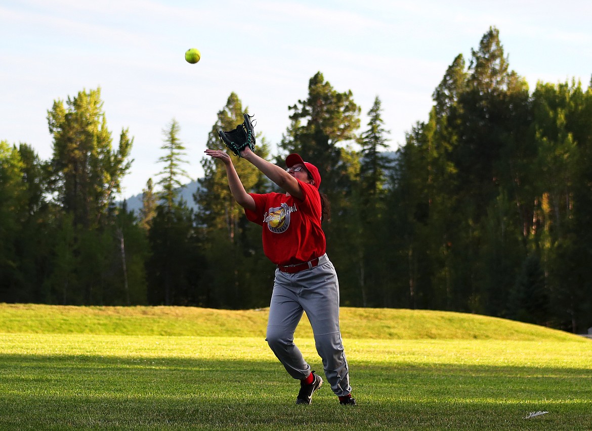 (Photo by KYLE CAJERO)
AnnaMarie Gonzalez prepares to catch a fly ball during game two of a summer league doubleheader against Troy, Montana on July 11.