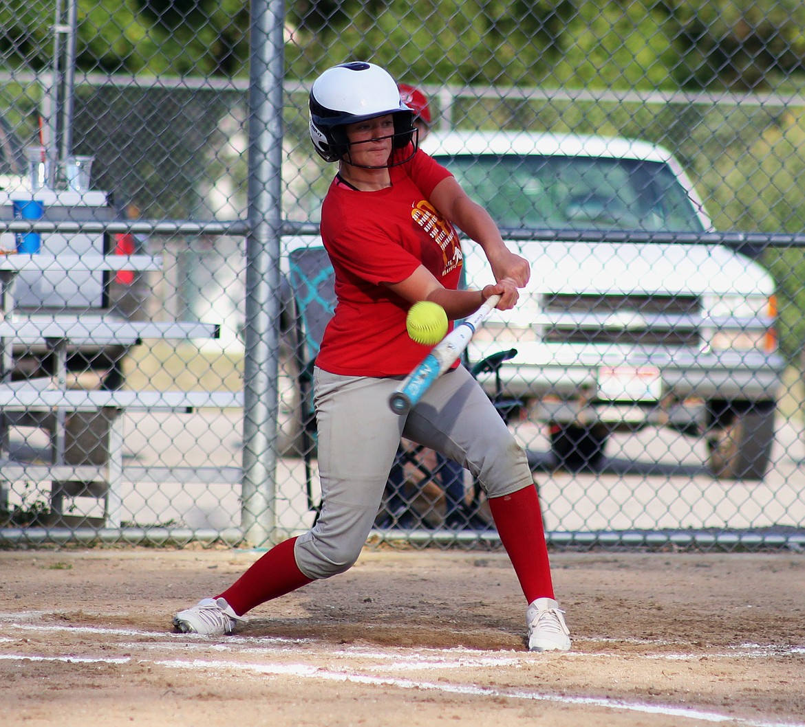 (Photo by KYLE CAJERO)
Sandpoint eighth grader Peyton Cessna makes contact during the Bulldogs&#146; summer league doubleheader against Troy, Montana on July 11.