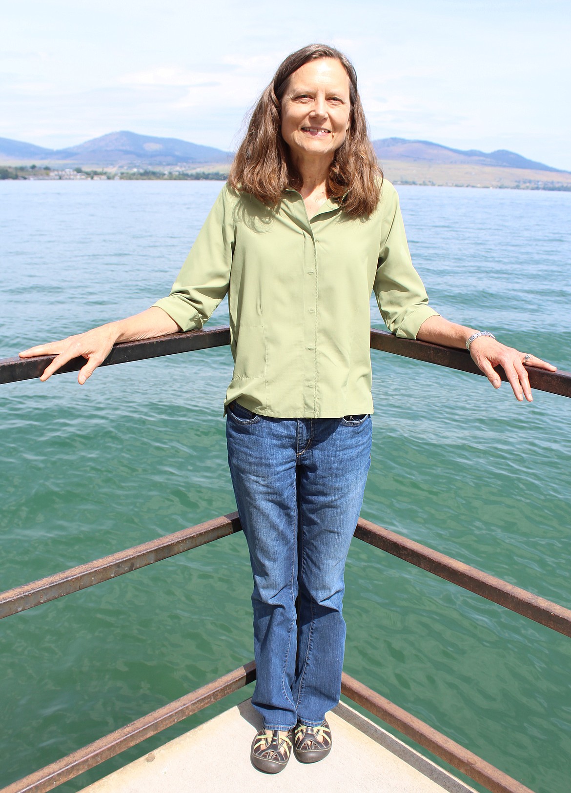 Robin Steinkraus, pictured near Flathead Lake in Polson, retires July 31 as executive director of the Flathead Lakers, a nonprofit organization focused on water quality and other issues in the Flathead Watershed. (Duncan Adams/Daily Inter Lake)