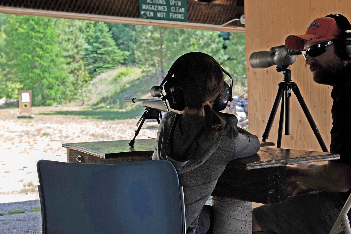 (Courtesy photo)A young shooter gets a lesson in shooting safety and having fun at the annual Youth Day at the Range recently.