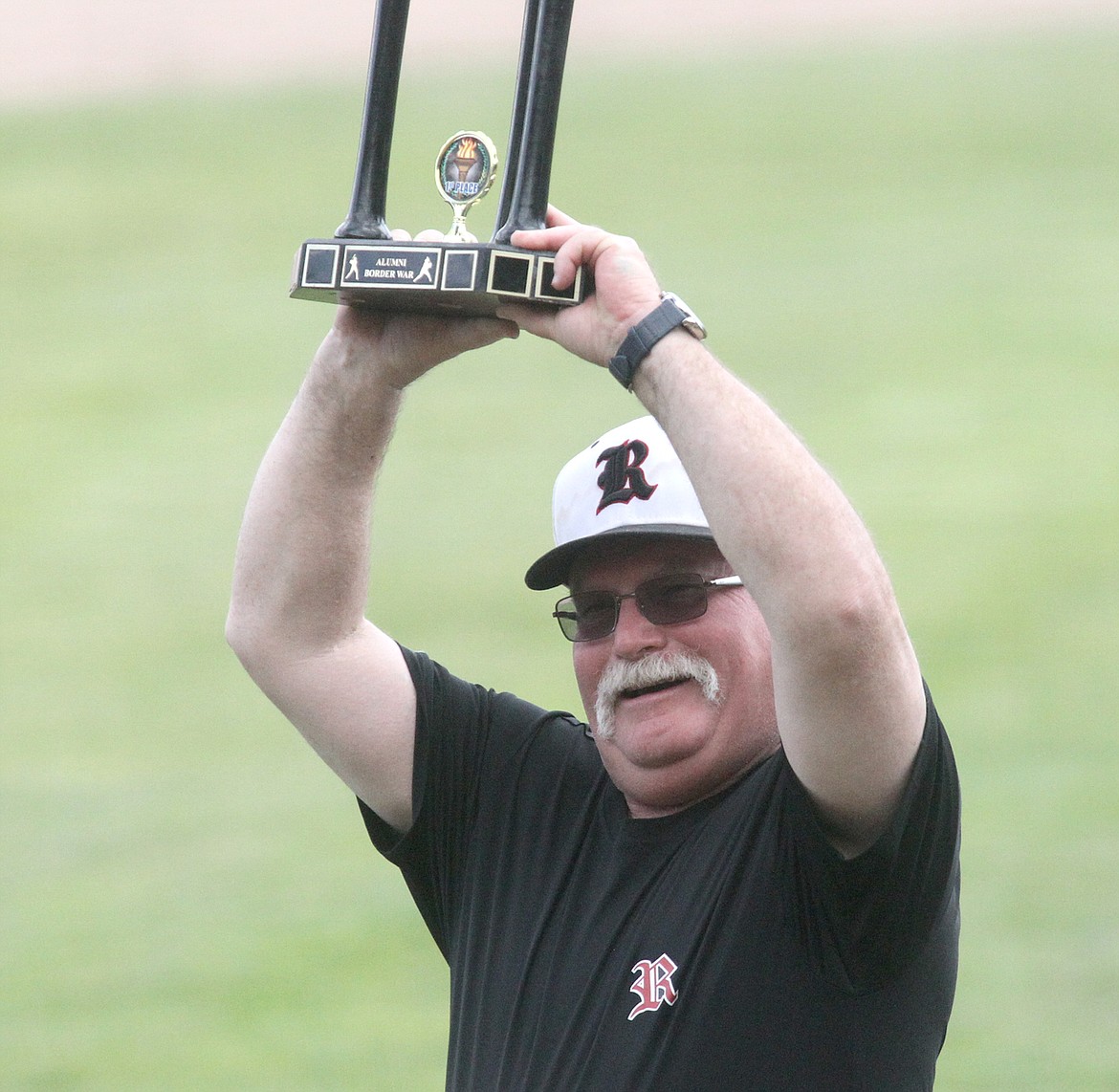 Strathmore Reds Alumni Coach Darwin Armitage displays the 2019 Alumni Border War trophy after the Reds defeated the Logger Alumni  16-14 Saturday. (Paul Sievers/The Western News)