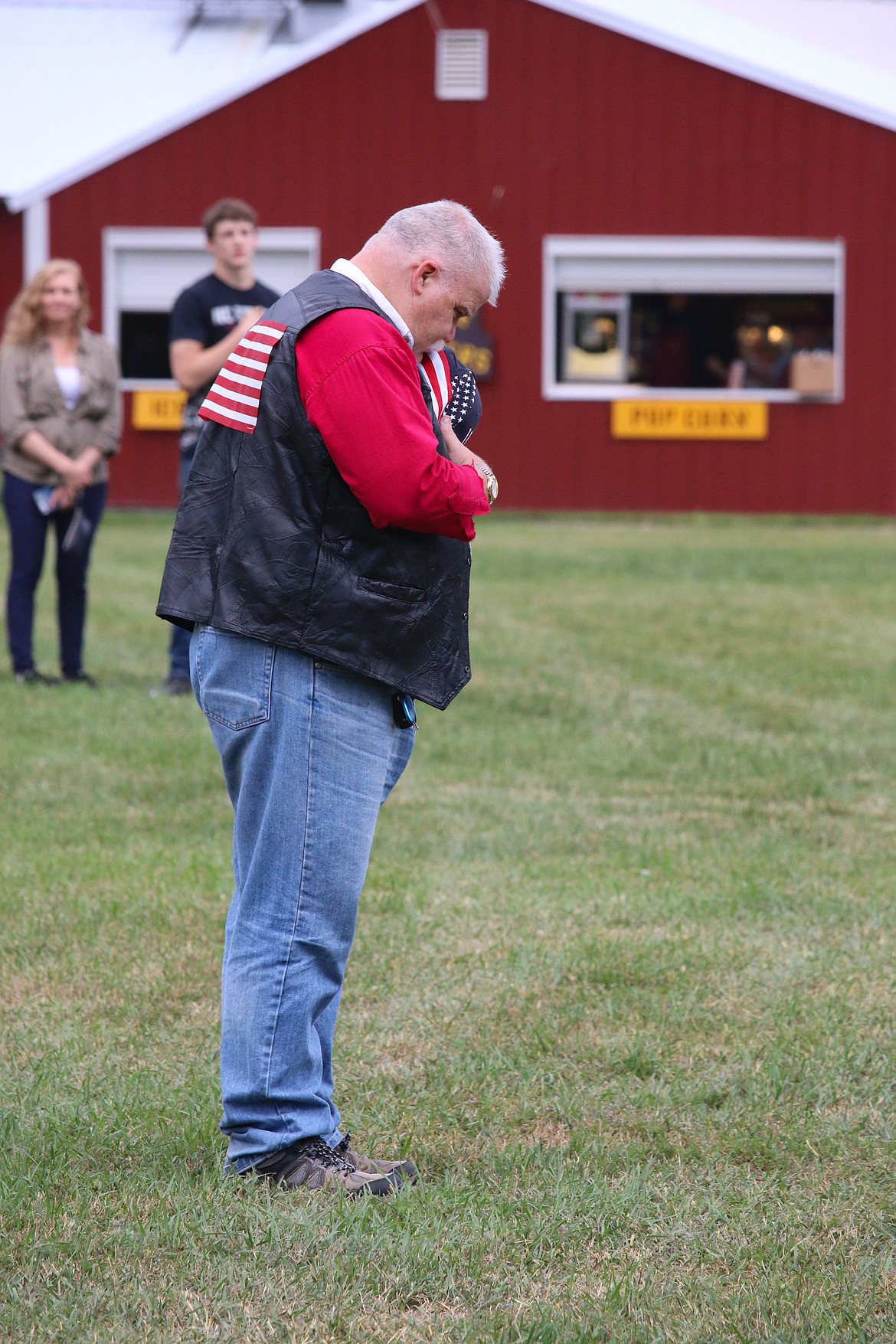 Photo by MANDI BATEMAN
Dave Koon during the opening ceremonies of the Fourth of July celebration, listening to the national anthem.