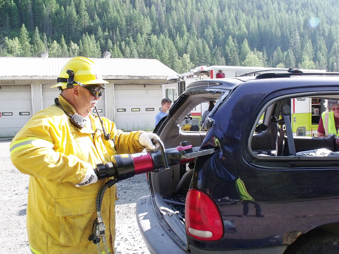 Volunteer KEITH Woody used the &#147;Jaws of Life&#148; during training exercise at the Saltese Station. (Courtesy photo)