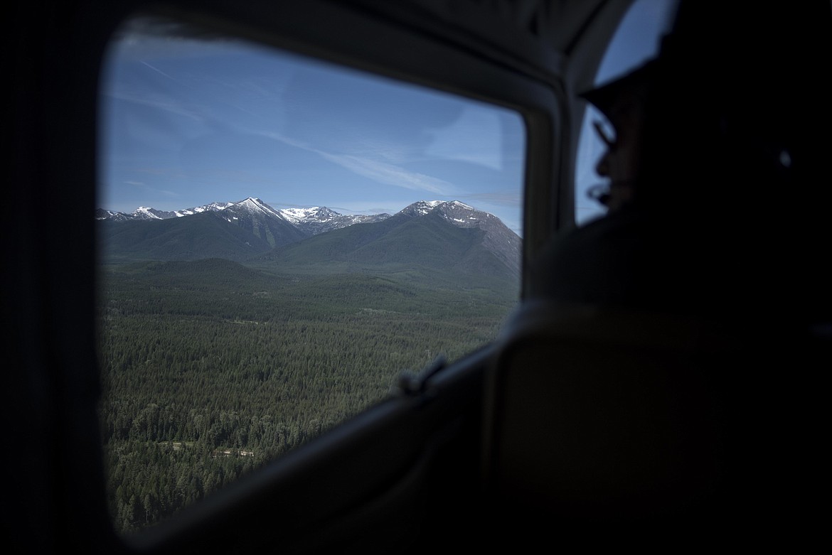 Bruce Gordon, president of EcoFlight, flies by the Cabinet Mountains to help show where the proposed southern trail change to the Pacific Northwest Trail would go, May 10 in Lincoln County. EcoFlight is an organization which advocates for the protection of wildlife habitat. (Luke Hollister/The Western News)