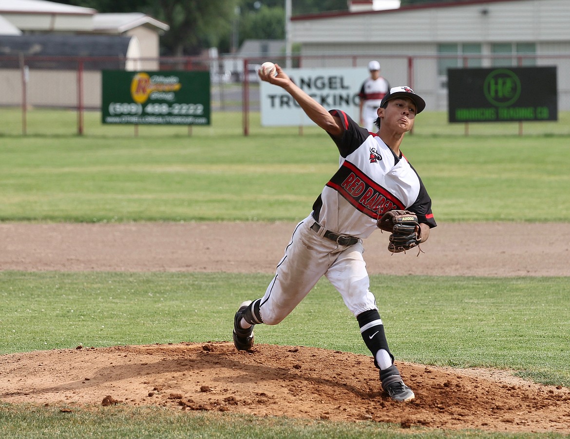 Casey McCarthy/Sun Tribune 
Jaxon Rocha pitches for the Red Raiders in game one against the Yakima Beetles in Othello.