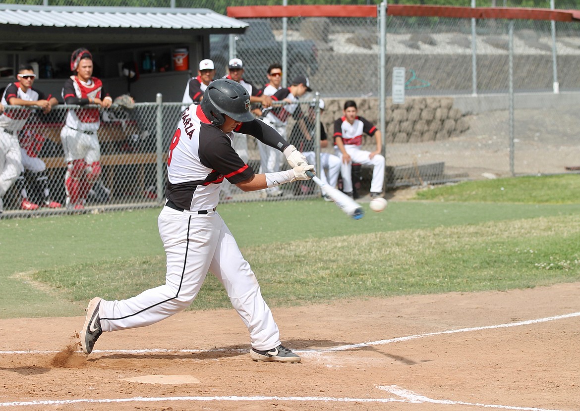 Casey McCarthy/Sun Tribune
Joshua Garza hits a shot for the Red Raiders against the Yakima Beetles. Othello took the series 3-1.