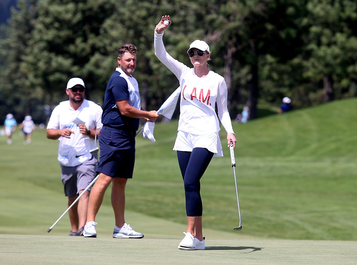 Actress Janet Gretzky, wife of Hockey Hall of Famer Wayne Gretzky, waves to the crowd after finishing at The Showcase celebrity golf exhibition Saturday at The Coeur d'Alene Resort Golf Course.  (LOREN BENOIT/Press)