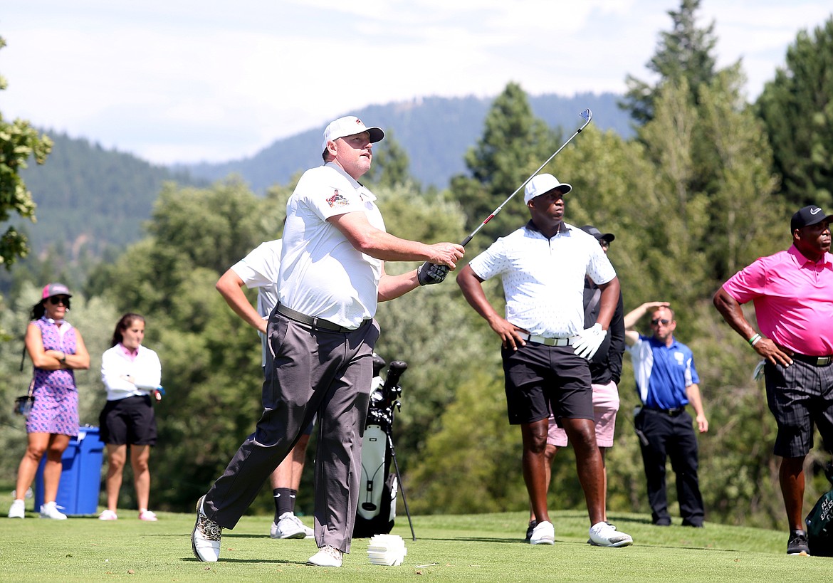 Former Major League Baseball pitcher Roger Clemens watches one of his tee shots at Saturday&#146;s Showcase.