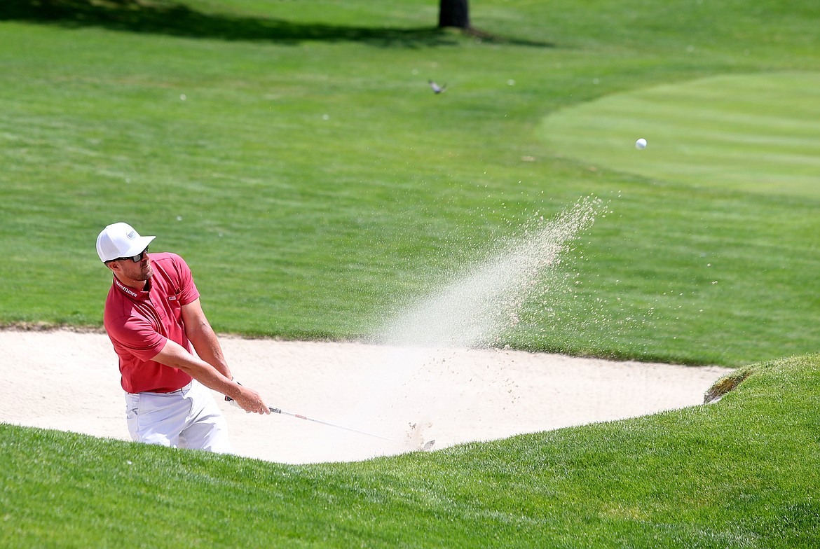 LOREN BENOIT/Press 
Former Major League Baseball pitcher Mark Mulder hits a ball out of a bunker during The Showcase celebrity golf exhibition on Saturday at The Coeur d&#146;Alene Resort Golf Course.