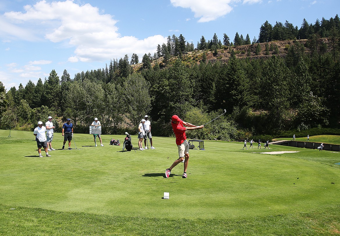 Former Gonzaga basketball player Adam Morrison tees off during the Showcase celebrity golf exhibition at The Coeur d&#146;Alene Resort Golf Course on Saturday. (LOREN BENOIT/Press)