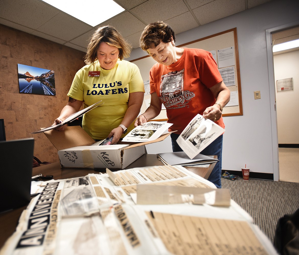 J.C. Penney Human Resources Supervisor Michelle Pearson and Merchandising supervisor Sue Aylesworth sort through a box of memorabilia collected and showing some of the store&#146;s 105-year history.