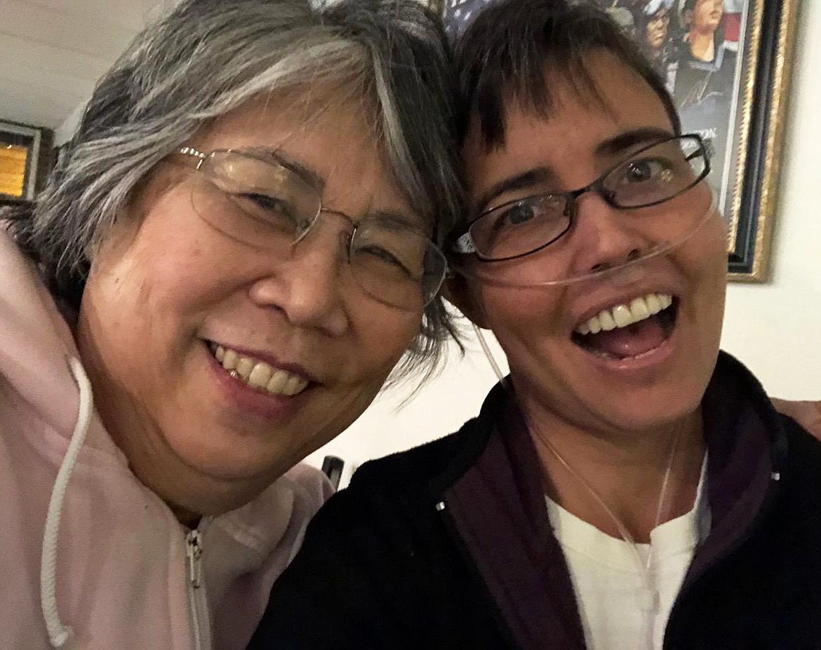 Jen McKenna and her mom share a moment while in North Carolina before Jen's double-lung transplant. A celebration of life for Jen will be held Aug. 17. &quot;If I learned anything from her, it's that no matter how hard things get, she always found the humor,&quot; said her husband, Corey McKenna. (Courtesy photo)