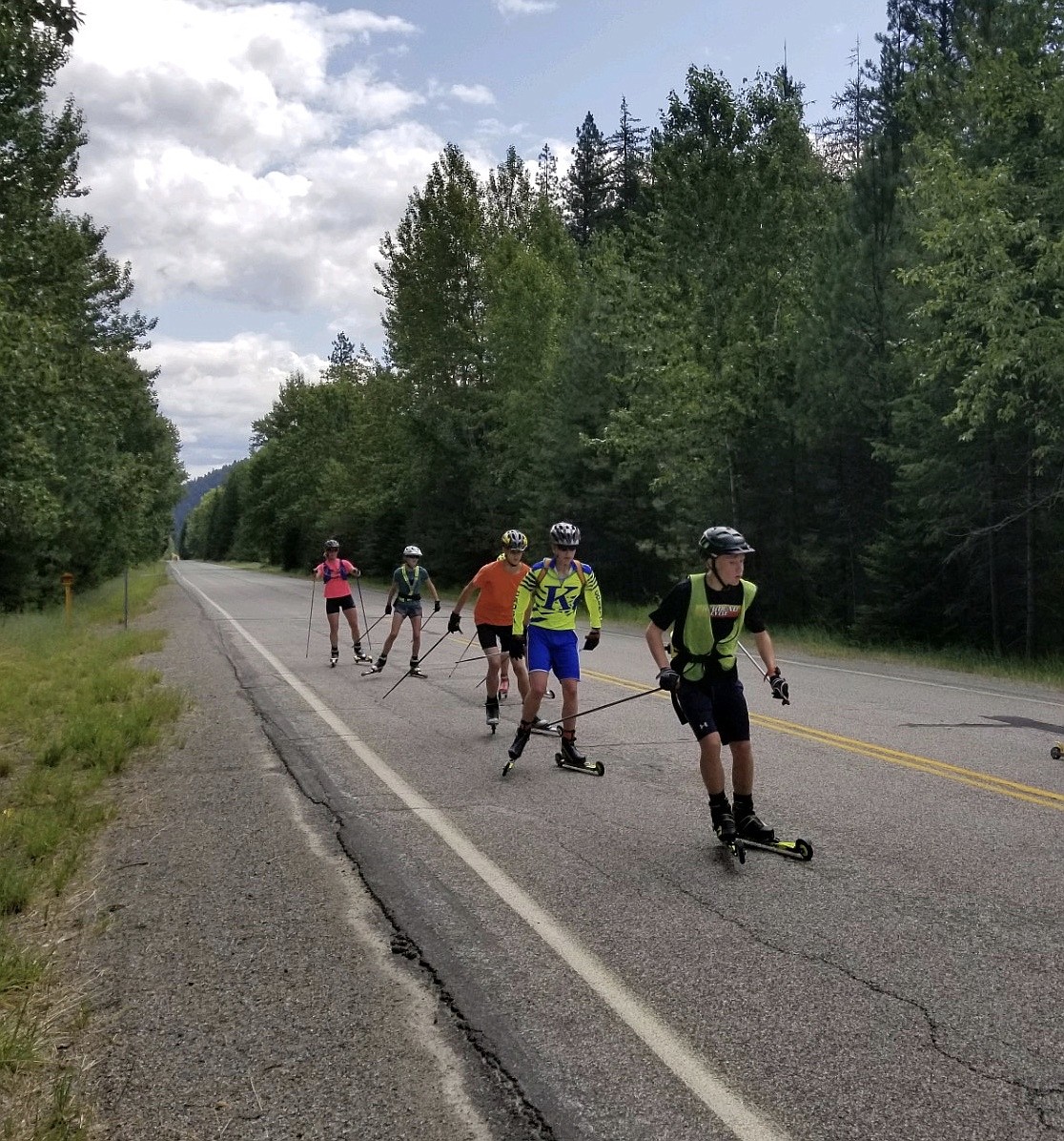 (Photo courtesy of VICKI LONGHINI)
Several Sandpoint Nordic Race Team skiiers, along with athletes from other Montana-area teams, practice skiing on a desloate stretch of road during the group&#146;s summer training camp, held in Thompson Falls, Montana last weekend.