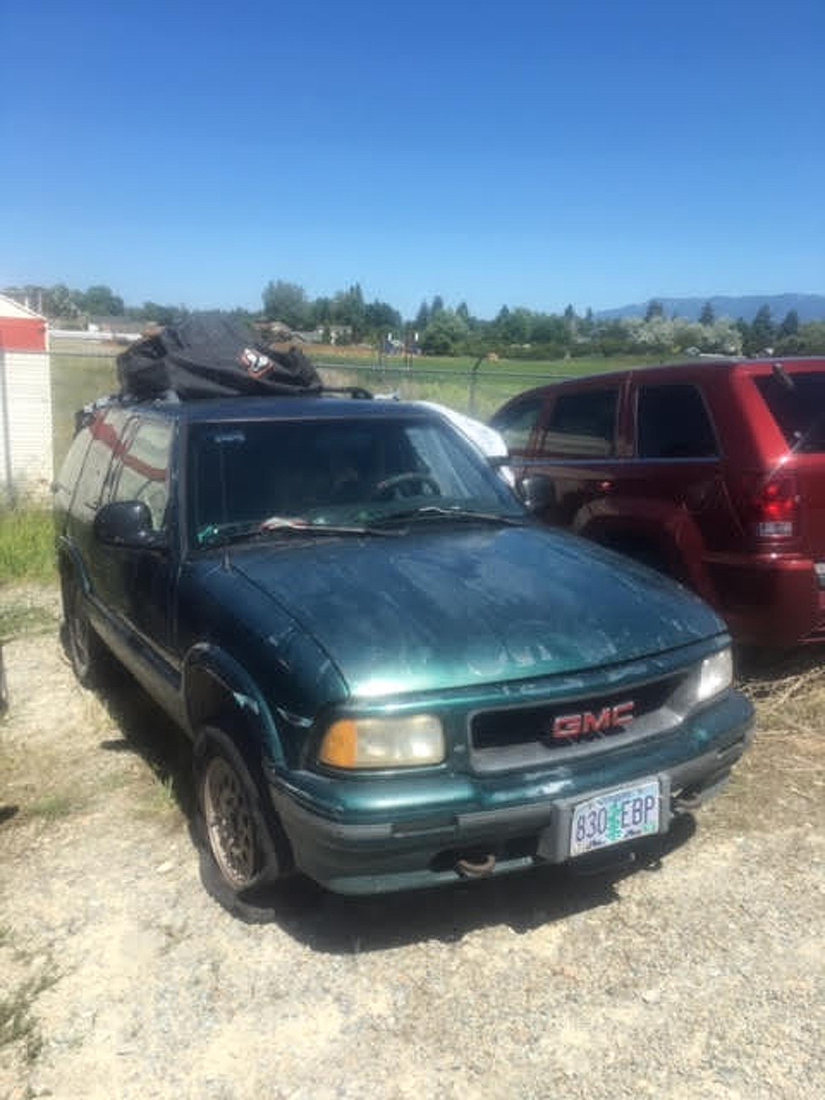 A POLICE photo of a GMC sport utility vehicle that law enforcement officers from Kalispell Police Department and the Flathead County Sheriff&#146;s Office pulled over late Wednesday night on U.S. 93, north of Kalispell. The vehicle held the bodies of 21-year-old Daniel Salcido and 24-year-old Hannah Janik, both of Medford, Oregon. Both died of gunshot wounds in an apparent murder-suicide. (Photo courtesy Flathead County Sheriff&#146;s Office.)