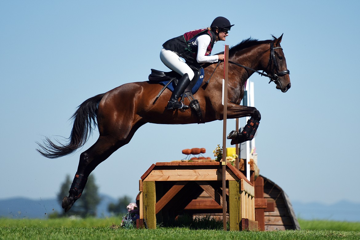 Amy Bowers rides Del Mar Belle in the Senior Open Novice E cross-country division during The Event at Rebecca Farm on Thursday. (Casey Kreider/Daily Inter Lake)