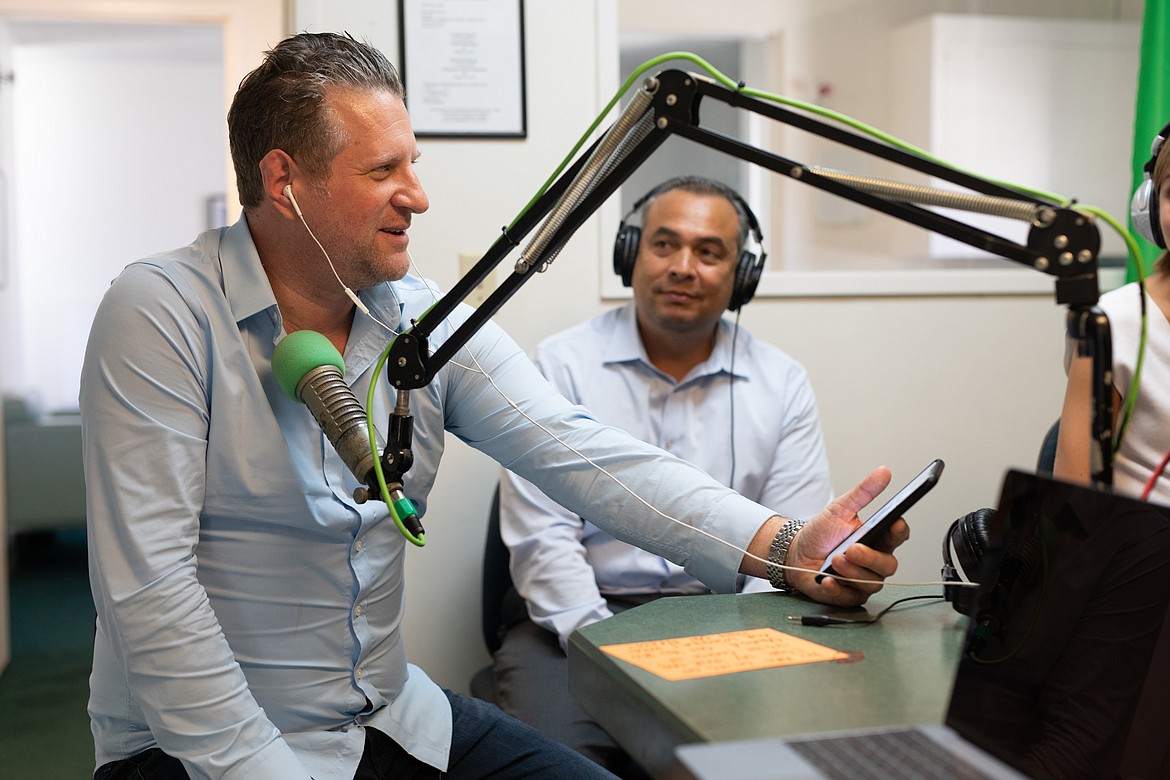 (Photo courtesy LUCIA KIEL PORTRAITS)
Jeremiah Higgins, left, is pictured in the radio studio where The Jeremiah Show is recorded in Santa Barbara, Calif. A 1989 graduate of Priest River Lamanna High School, Higgins recently hired Jillian Stevens, who was still a senior at PRLHS at the time, as an intern for his company HJL Hospitality, though she now works with the radio show as well.