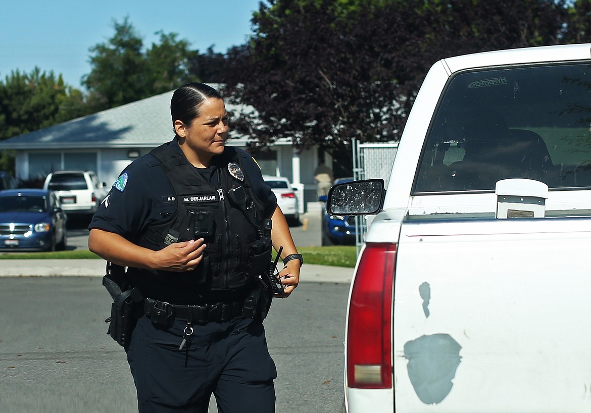 Post Falls Police Officer Makayla Desjarlais makes a traffic stop in Post Falls on Tuesday. A courtesy note was issued to the driver, who didn't have a license plate displayed on the front of the vehicle. (LOREN BENOIT/Press)