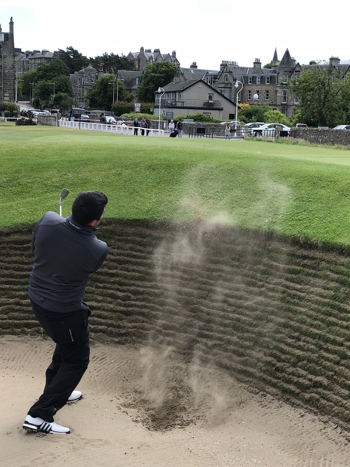 Photo courtesy REID HATLEY
Reid Hatley hits out of a pot bunker at Carnoustie in 2018.