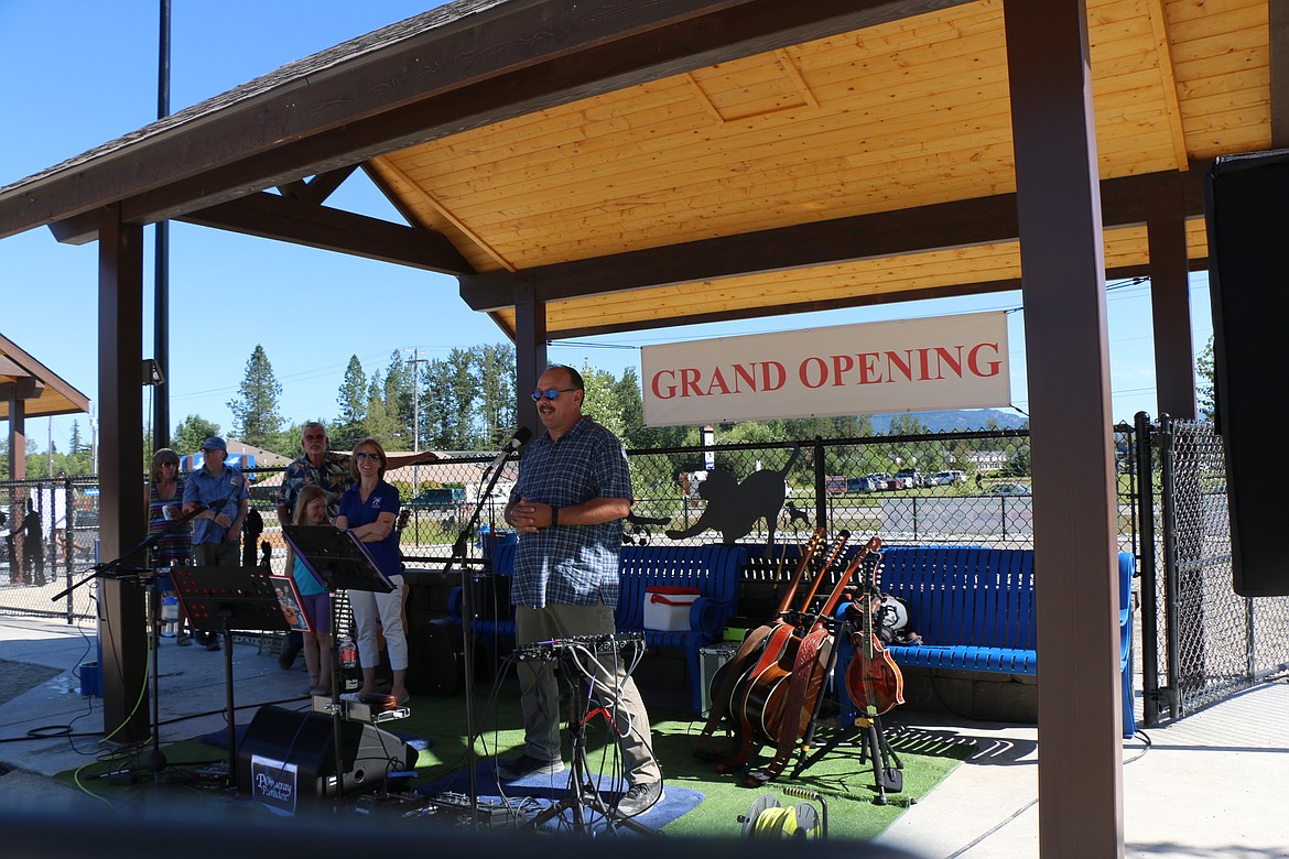 (Photo by CAROLINE LOBSINGER)
Ponderay Mayor Steve Geiger addresses the crowd gathered for a special grand opening of the Ponderay Dog Park this past Sunday reserved for the donors and sponsors of the park. A public grand opening will be held from 3-6 p.m. this Sunday at the park, located next to Panhandle Animal Shelter on Kootenai Cutoff Road.